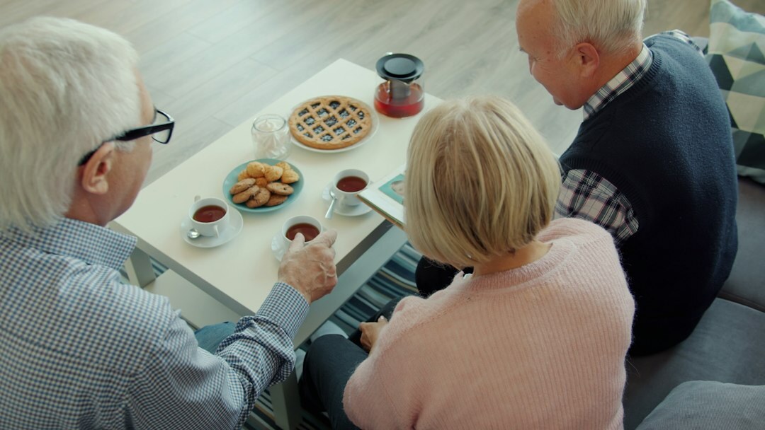financial advisor with elderly couple
